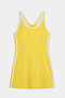 The SPLITS59 Ella Airweight Dress in Bright Yellow/White features a sleeveless design with white trim, vertical stripes, and built-in shorts—perfect for court sports. Shown on a plain white background.