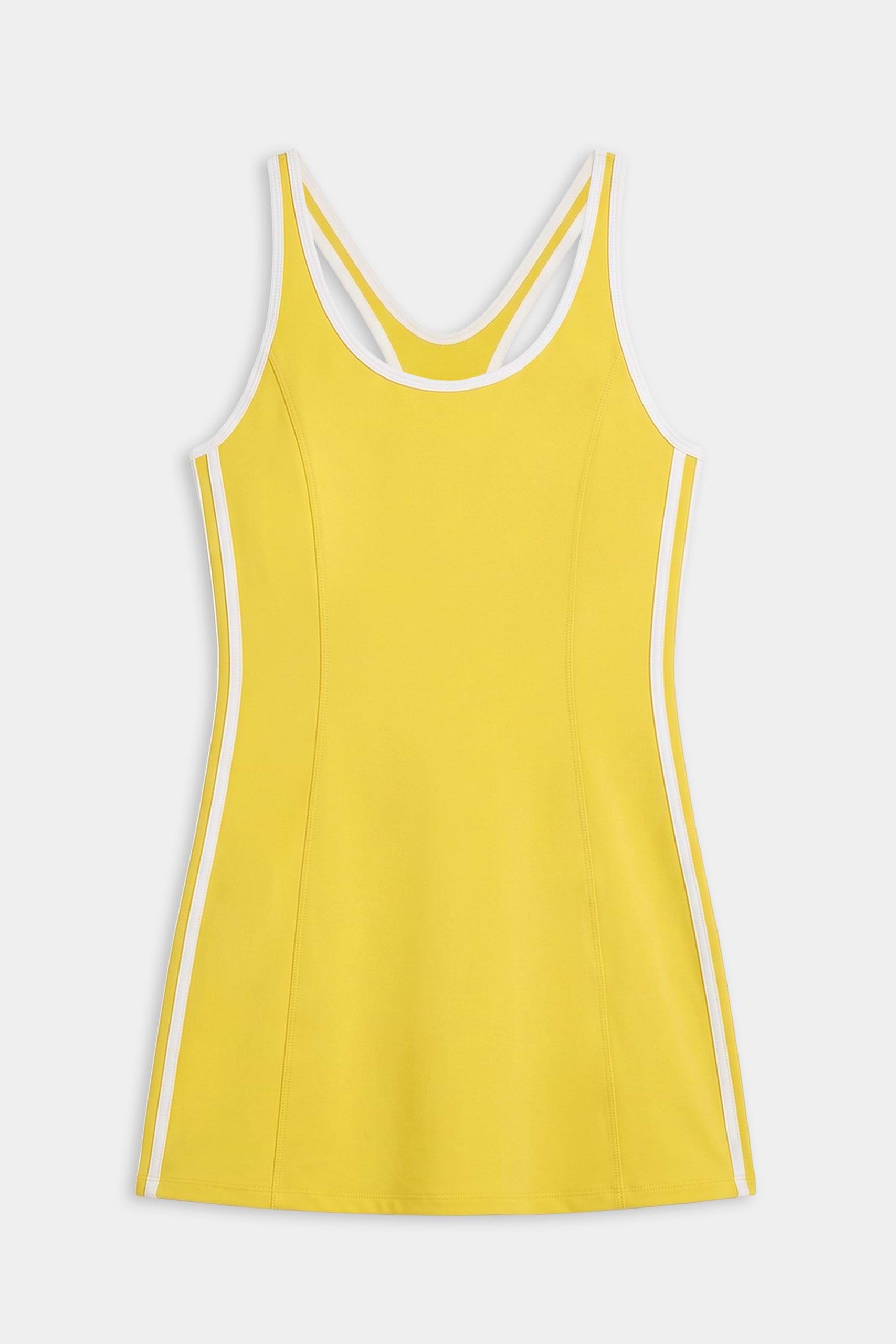 The SPLITS59 Ella Airweight Dress in Bright Yellow/White features a sleeveless design with white trim, vertical stripes, and built-in shorts—perfect for court sports. Shown on a plain white background.