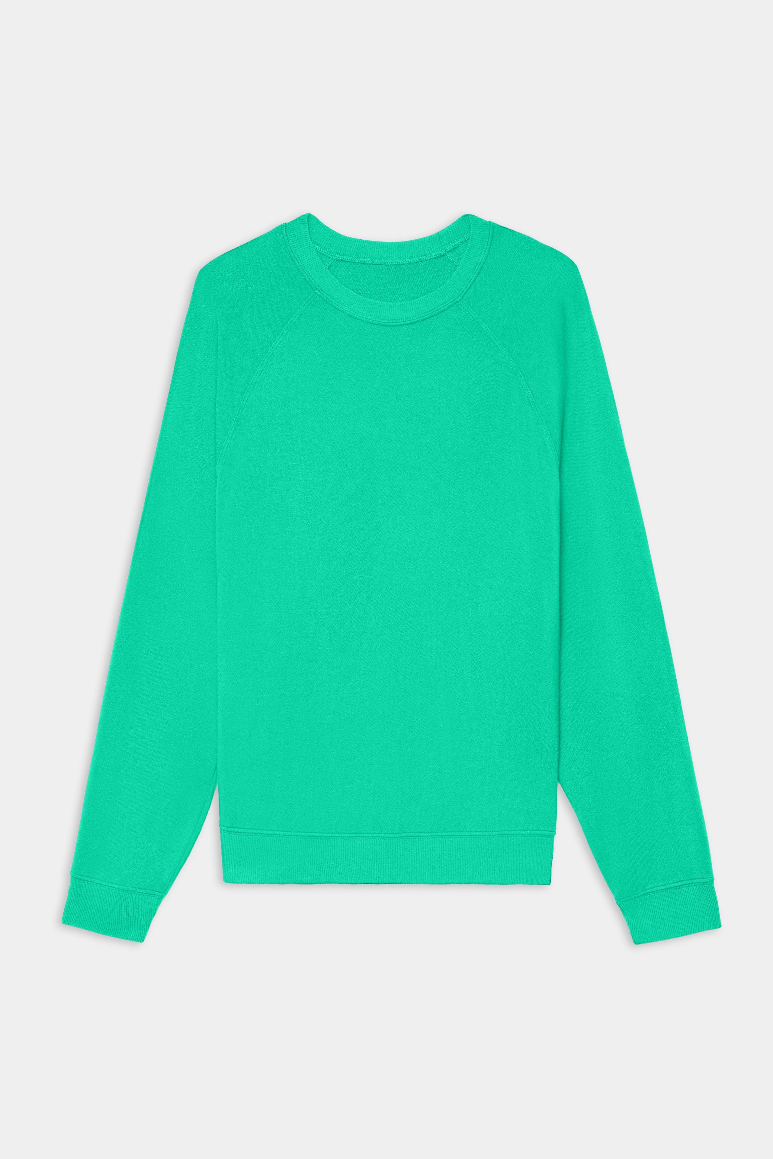 The SPLITS59 Andie Oversized Fleece Sweatshirt in Spearmint, a long-sleeved crewneck pullover made in Los Angeles, is shown laid flat on a white background.