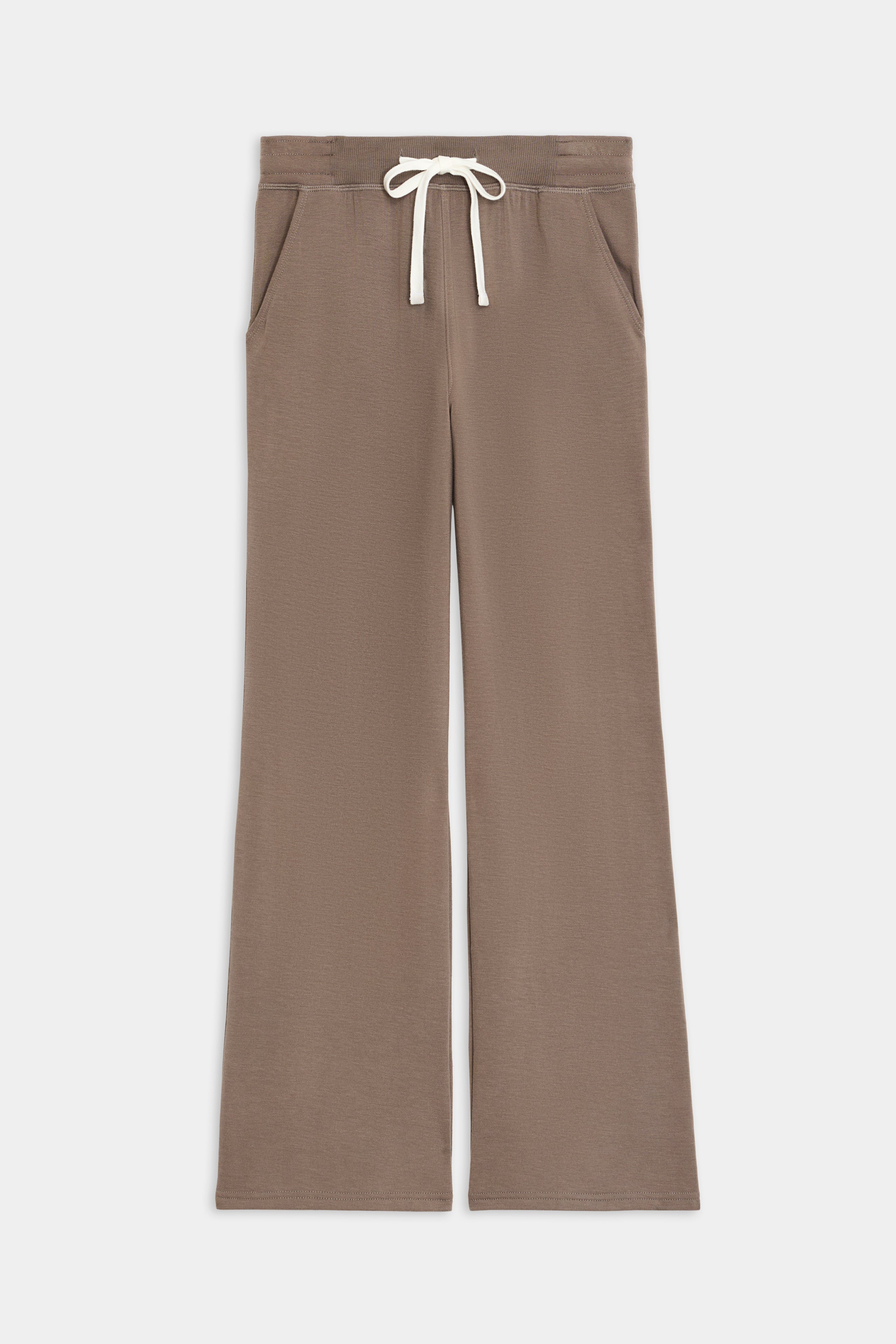 Introducing the Raven Fleece Full Length Sweatpant in Lentil, a luxurious creation by SPLITS59. Made in Los Angeles for exceptional comfort and style, these pants are crafted from ultra-luxe fleece and feature convenient side pockets along with flared legs, designed to lay flat.