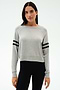A woman faces forward in a SPLITS59 Brooks Stripe Fleece Sweatshirt, light grey with black sleeve stripes, paired with black leggings, set against a plain light background.