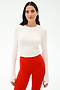 A person faces forward against a plain light background, wearing the SPLITS59 Louise Rib Long Sleeve Crop in white paired with high-waisted red leggings.