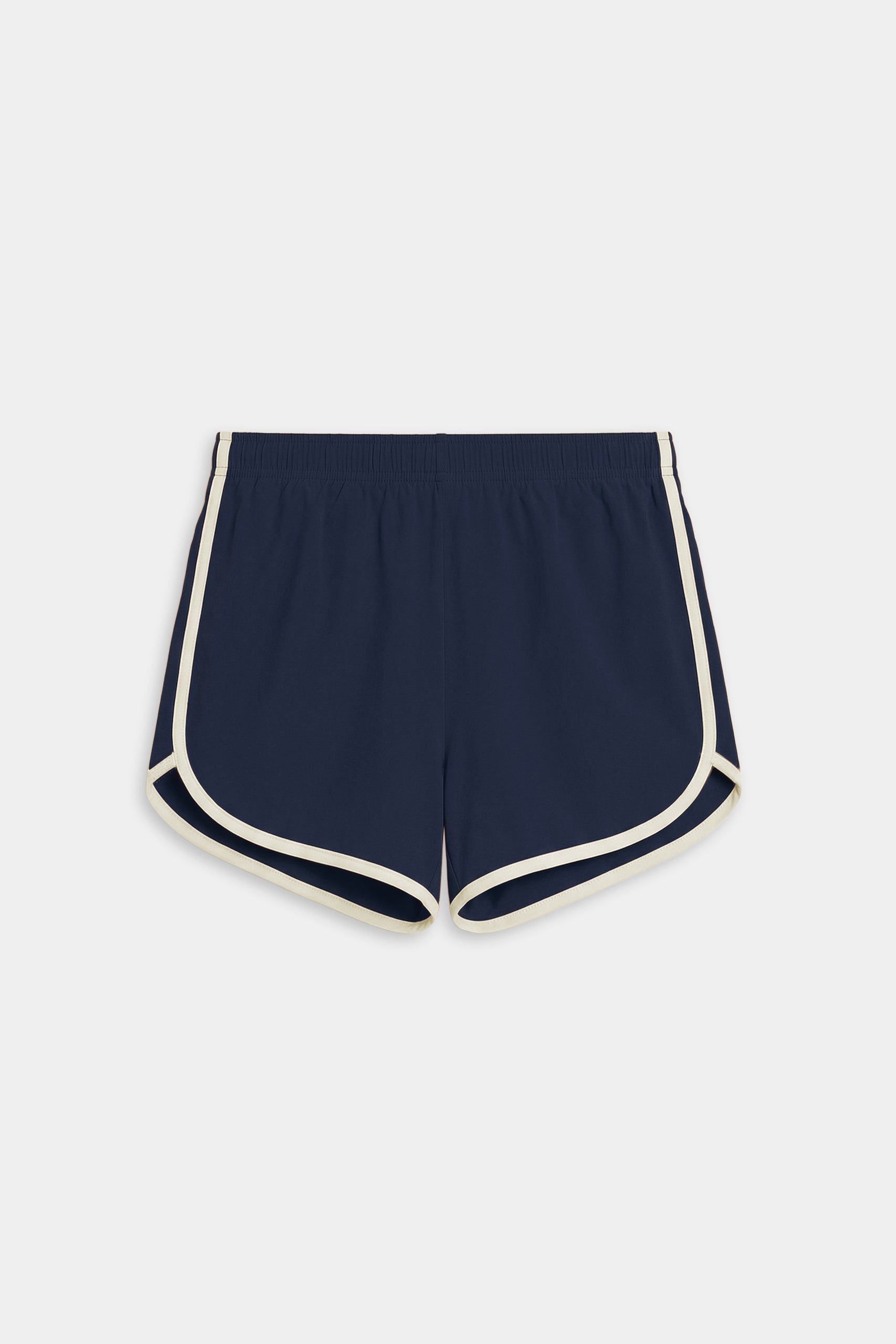 The SPLITS59 Megan Woven Nylon Run Short in Indigo/Creme features a curved hem, elastic waistband, and white trim. Made from a comfortable spandex-nylon blend, the shorts are displayed flat on a white background.