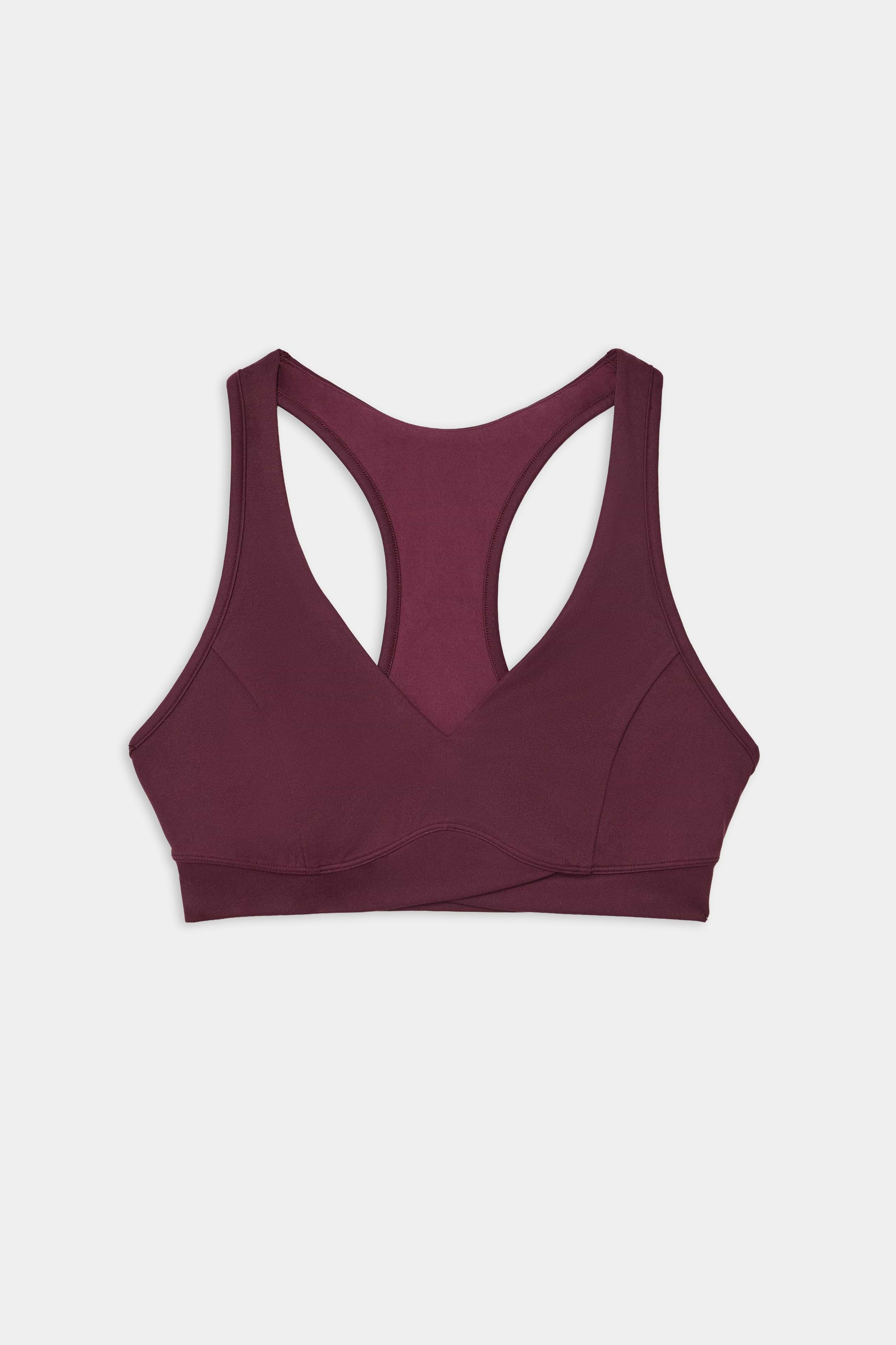 The SPLITS59 Mia Rigor Bra in Dark Cherry, a soft nylon-spandex racerback sports bra, is laid flat on a white background.