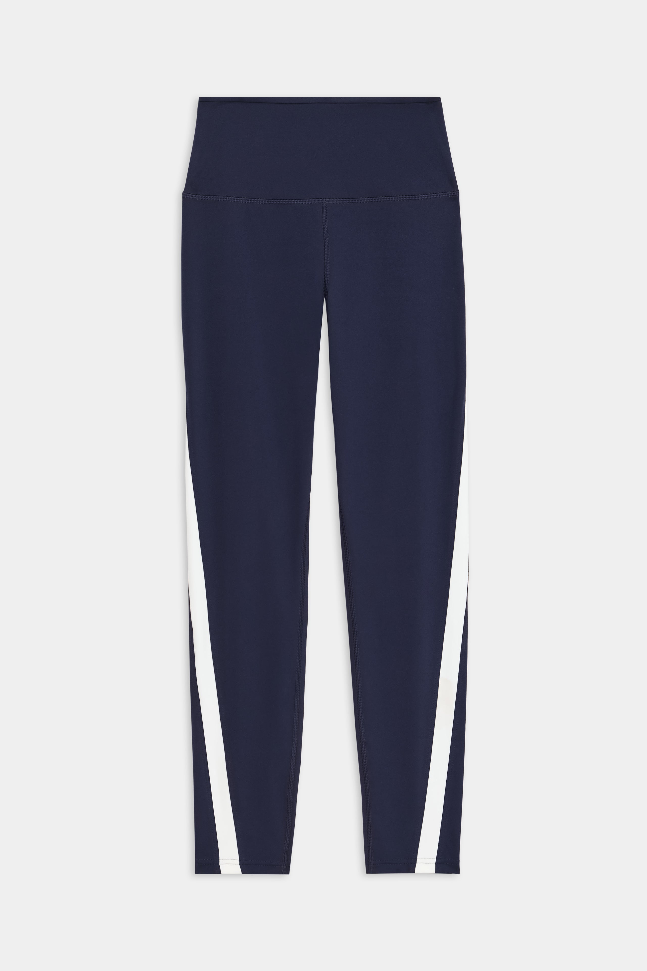 The Miles High Waist Rigor 7/8 leggings by SPLITS59 are navy blue with white diagonal side stripes, featuring a high waistband and full-length design set against a white background.