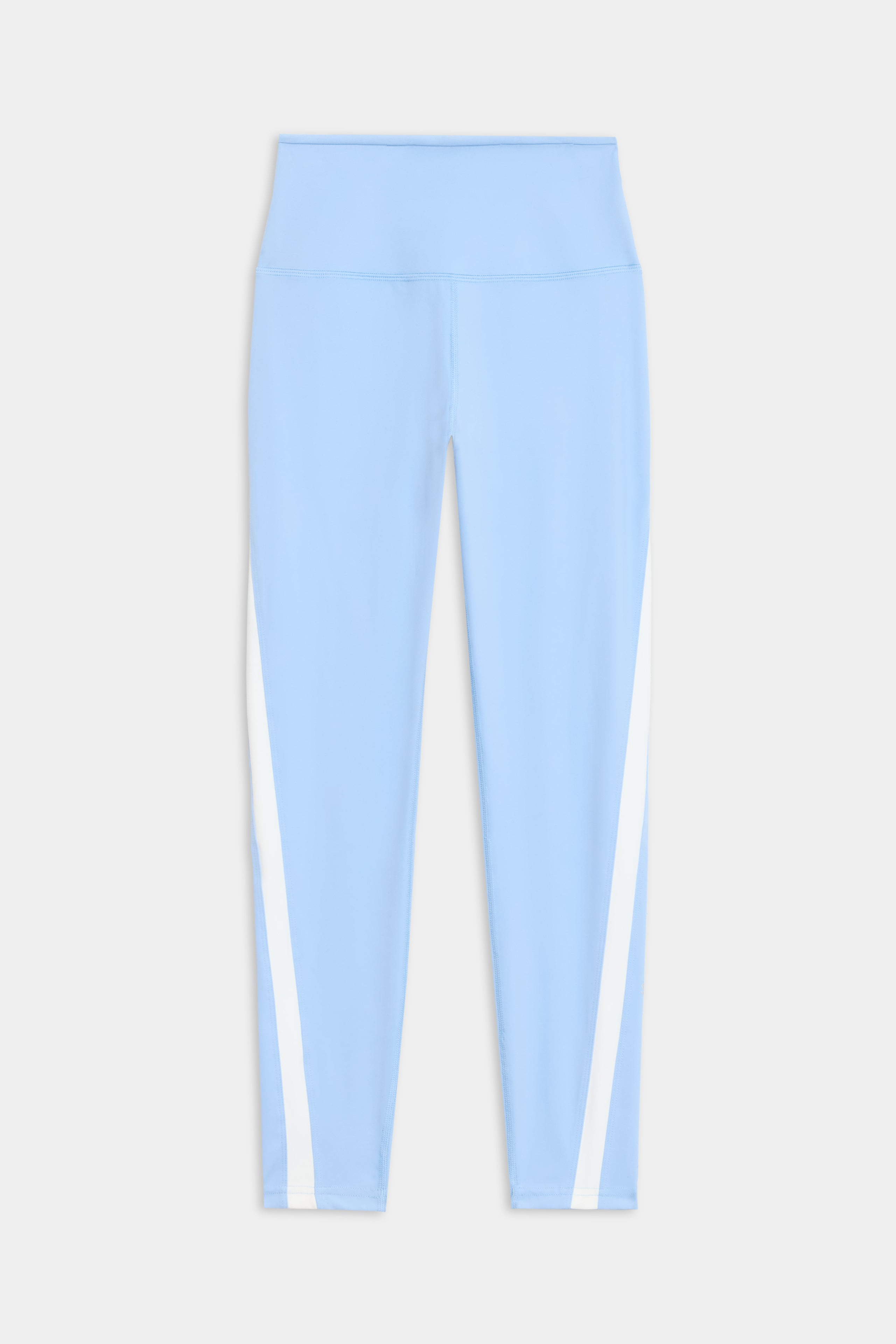 The Miles High Waist Rigor 7/8 leggings by SPLITS59 are light blue with a high waistband and white vertical side stripes, displayed flat against a white background.