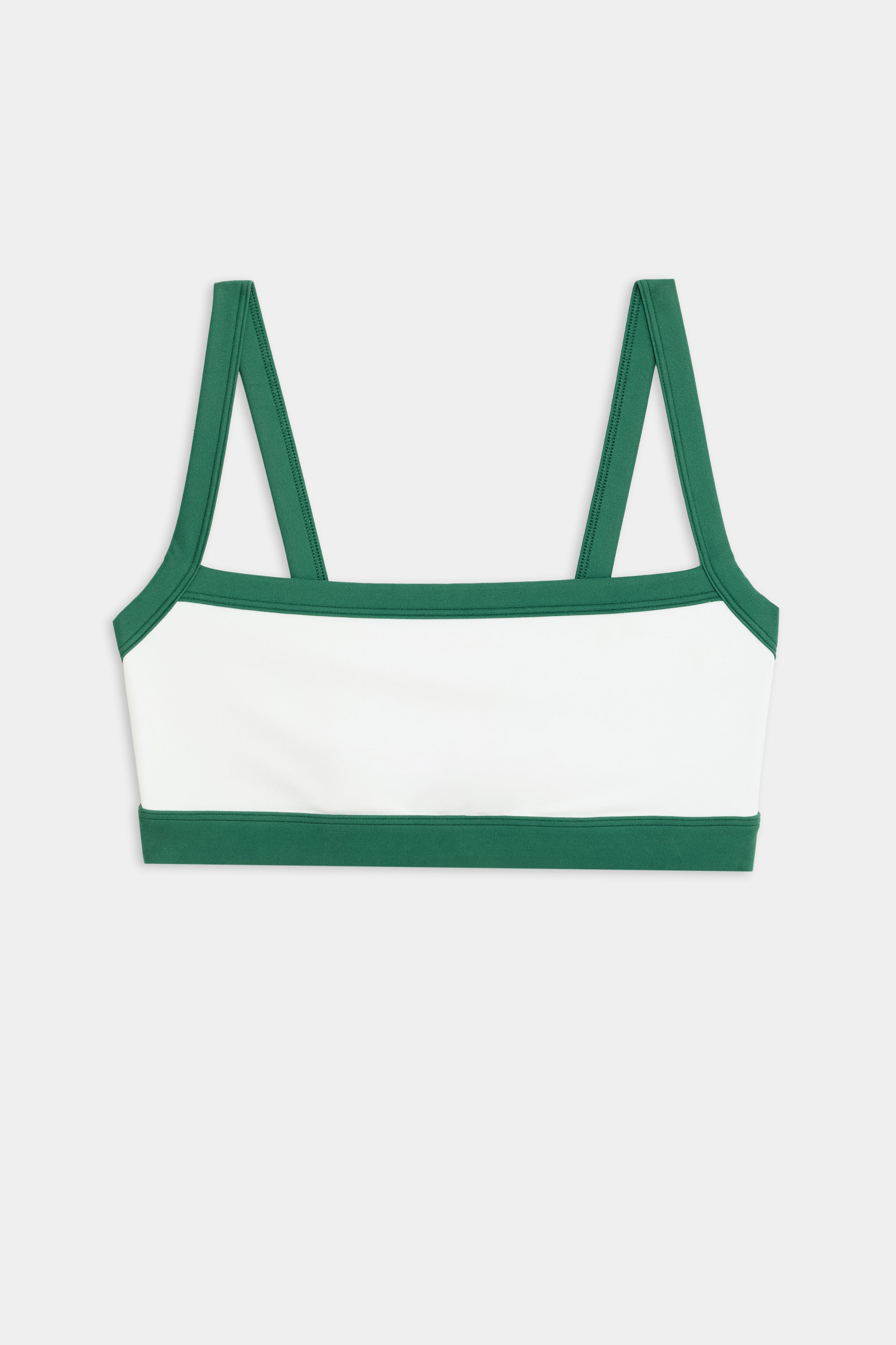 Introducing the SPLITS59 Monah Rigor Bra in White/Arugula: a stylish sports bra with robust green straps and band, perfect for running or gym workouts. Displayed on a plain white background, it blends style and functionality seamlessly.