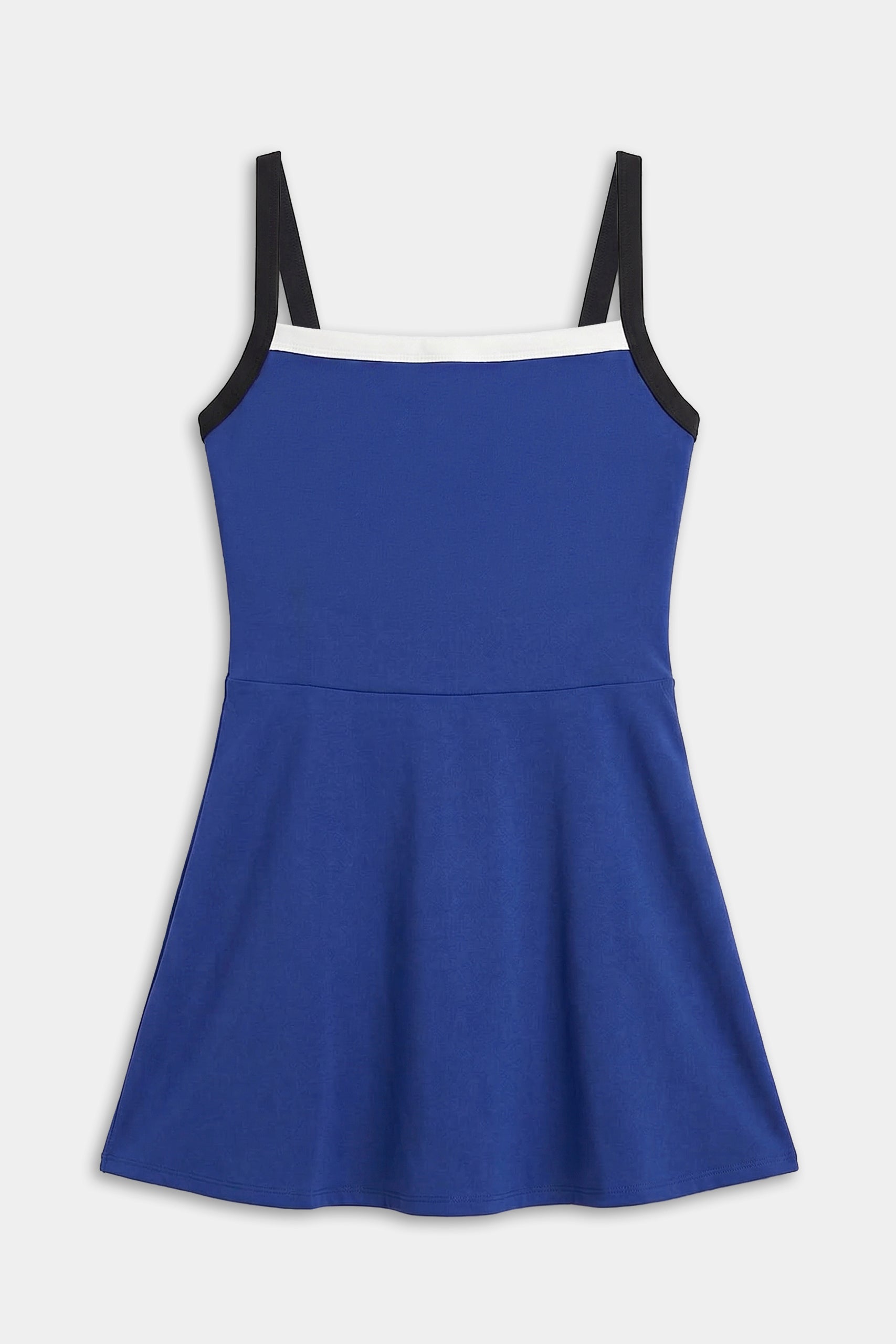 The SPLITS59 Monah Rigor Dress in cobalt and black features a sleeveless design, black shoulder straps, and a white neckline trim, shown flat on a white background.