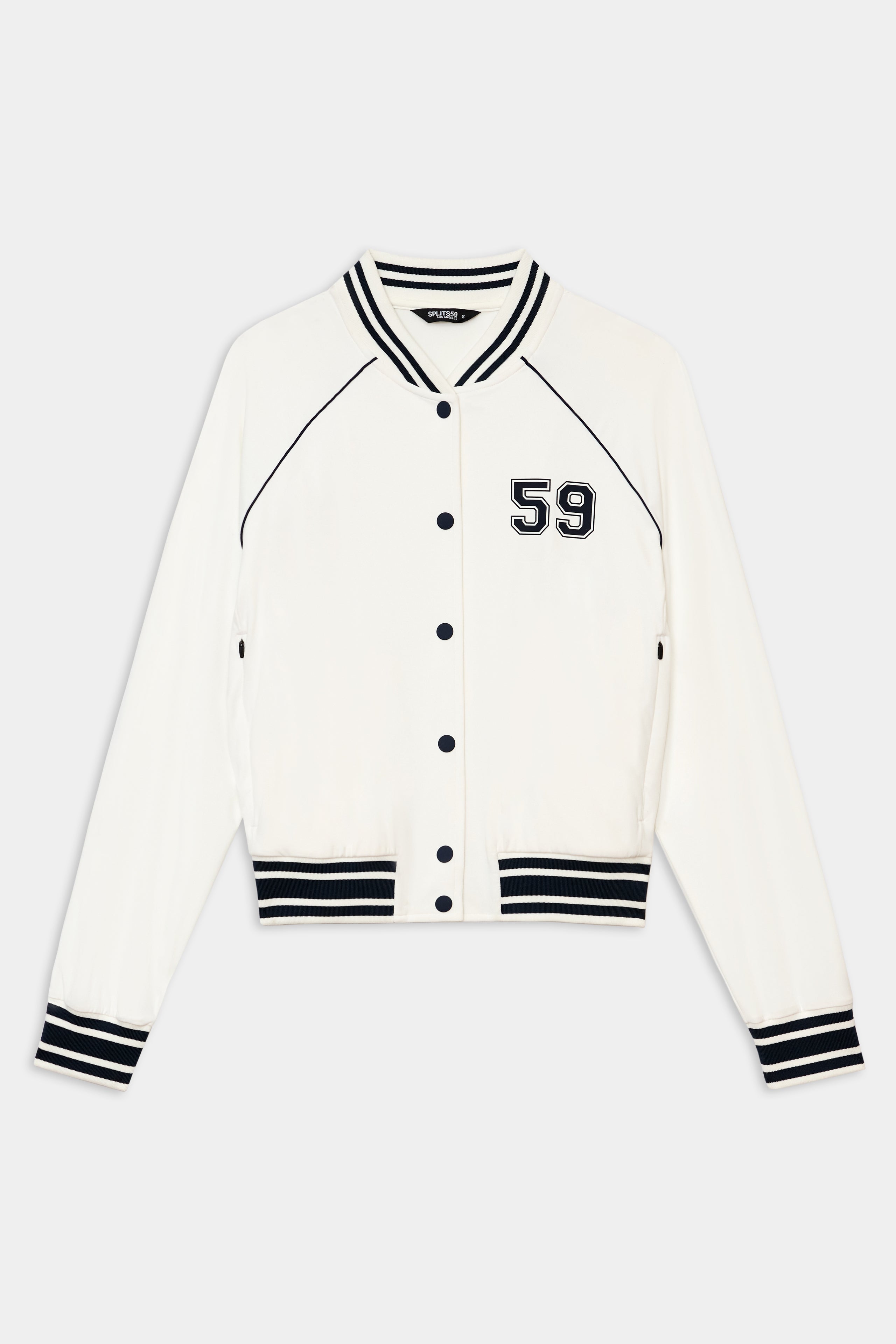 The SPLITS59 Hayes Varsity Rigor Jacket in white is crafted from a nylon-spandex blend, with black striped trim, black buttons, and a "59" detail on the left chest.