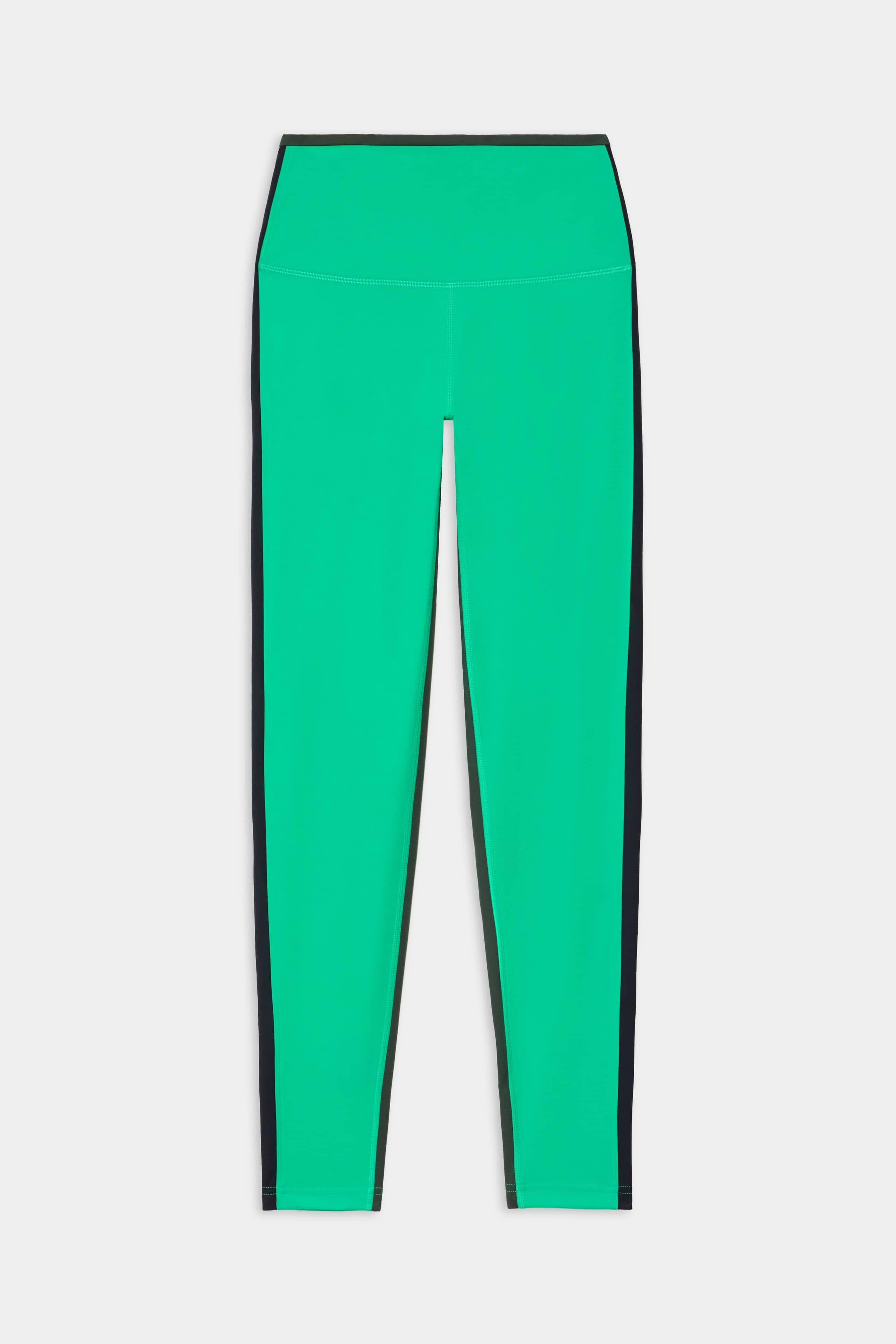 The SPLITS59 Sam High Waist Rigor 7/8 leggings in Spearmint/Indigo feature a high waist and black side panels, crafted from Rigor fabric, and are shown on a plain white background.