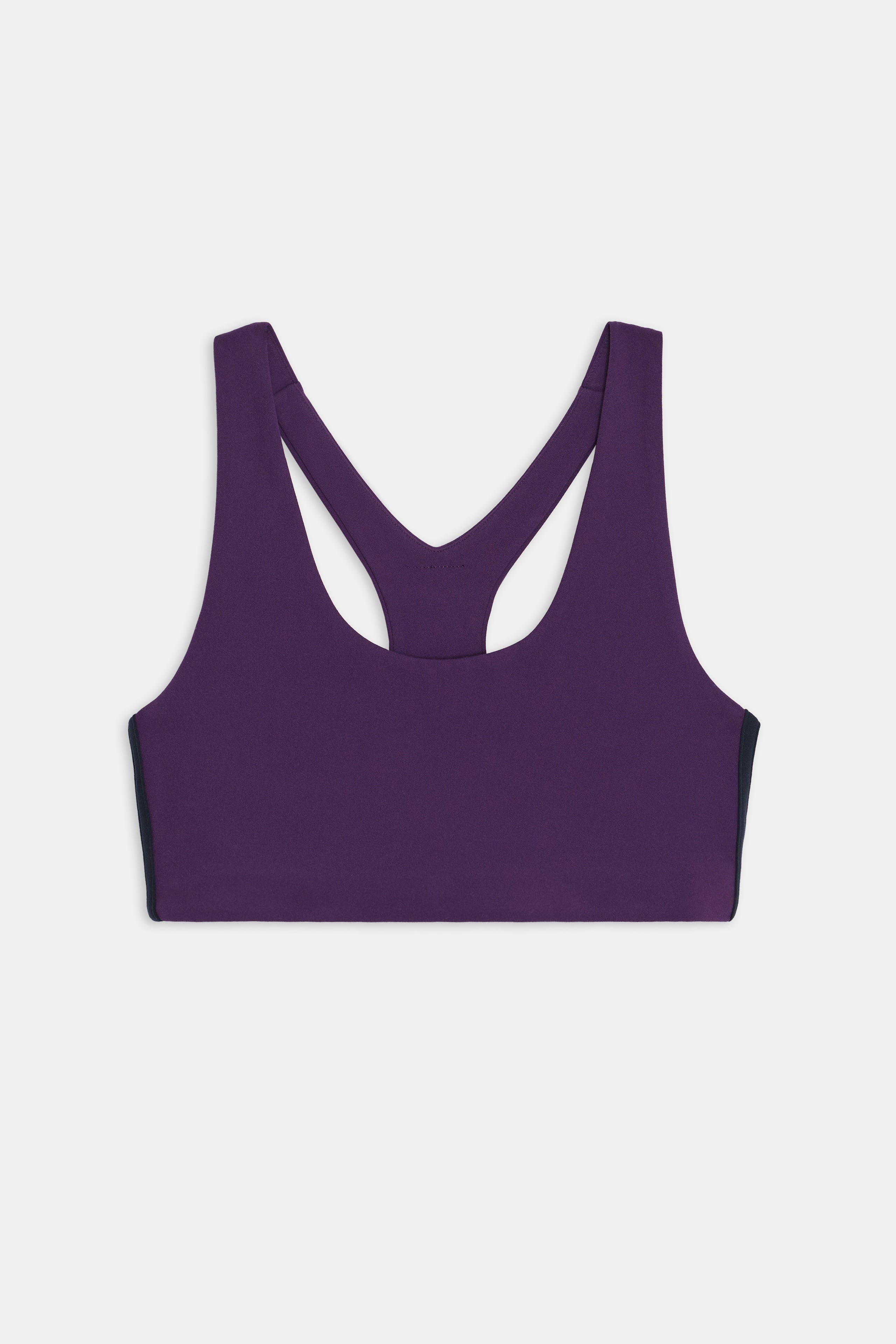 The SPLITS59 Ella Airweight Bra in Black Currant/Indigo boasts a racerback design, ideal for hot yoga, showcased against a plain white background.
