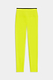 The Easton Rigor High Waist 7/8 leggings by SPLITS59, in chartreuse with black trim, are perfect for gym workouts. Crafted from durable Rigor fabric, they feature a high waistband and are displayed flat against a plain white background.