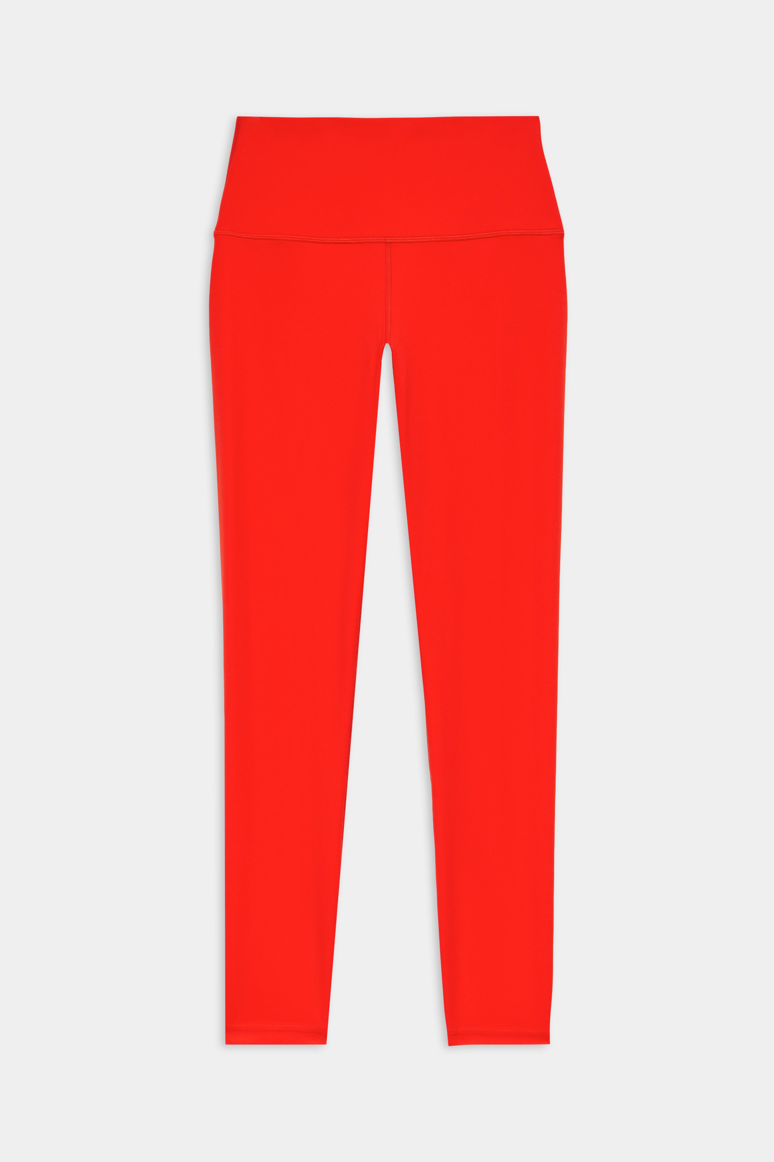 The SPLITS59 Sprint High Waist Rigor 7/8 leggings in Lotus Red feature a bright hue and high rise, crafted from Rigor fabric and shown full-length against a white background.