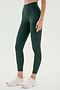 A person in SPLITS59’s Airweight High Waist Legging - Military, crafted from soft Airweight fabric, and white sneakers stands against a light background—ideal for hot yoga or everyday wear.
