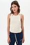 Young woman posing in a SPLITS59 Frida Jersey Tank in Vintage White designed for gym workouts and blue sweatpants.