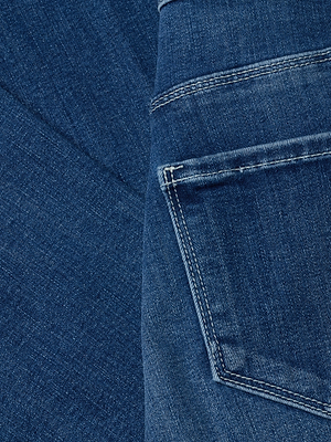 Close-up of the Kendra Cropped Flare Jean in blue denim, featuring a jeans pocket with visible stitching and textured weave. The image highlights color variations and the rich depth of its dark wash, characteristic of this cropped flare style.
