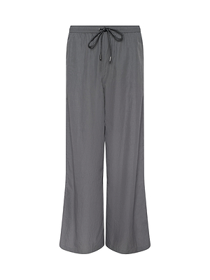 The Valkyrie Snap Pant is a loose-fitting gray wide-leg style with an elastic waistband and black drawstring tie, shown on a white background. Features a relaxed, casual look.