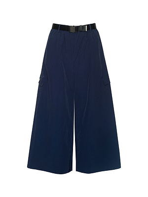 The Shoda Cropped Wide-Leg Pant in navy blue features side pockets, a black belt, and water-repellent fabric, shown on a white background.
