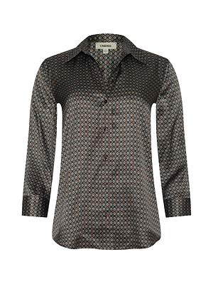 The Dani Silk Blouse features long sleeves, a pointed collar, and a relaxed fit with a small art deco print in black, blue, and tan on silk-like fabric.