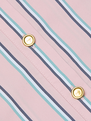 Close-up of the Cosette Shirt—pink tailored fit in an organic cotton blend with teal, white, and navy blue vertical stripes, featuring two gold LOEWE-engraved buttons.