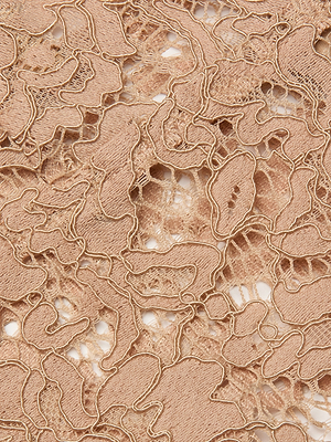 Close-up of the Aislin Lace Bralette, showcasing beige lace with intricate, irregular floral patterns, visible embroidery threads, and scalloped edges that enhance its delicate, textured look.