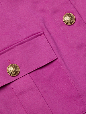 Close-up of the Midy Button-Front Dress in fuchsia stretch cotton twill, showcasing a flap pocket and two decorative gold embossed buttons.