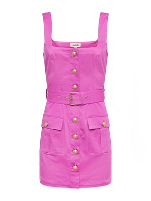 The Midy Button-Front Dress is a sleeveless fuchsia mini in stretch cotton twill, featuring a square neckline, gold front buttons, two front pockets, a matching belt with gold buckle, and a tailored fit.
