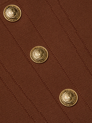 Close-up of the Saga Top in chocolate brown fabric, showcasing diagonal stitching and three engraved gold buttons arranged vertically for a corset-inspired look.