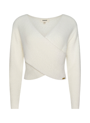 The Antonella Crossover Sweater is an ivory knit wrap with long sleeves, a deep V-neckline, a cropped, slightly fitted silhouette, and features visible L’AGENCE branding at the collar plus a small gold tag at the hem.