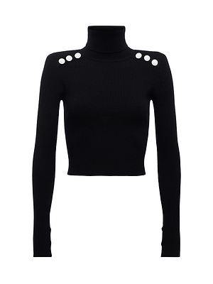 The Colette Cropped Turtleneck is a black, long-sleeve, ribbed knit top featuring a cropped fit and four statement buttons on each shoulder.