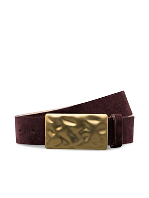 The Chara Suede Belt by L'AGENCE features rich burgundy suede and a wide, hammered gold-plated buckle. Handcrafted in LA, it’s shown coiled with the bold buckle facing forward.