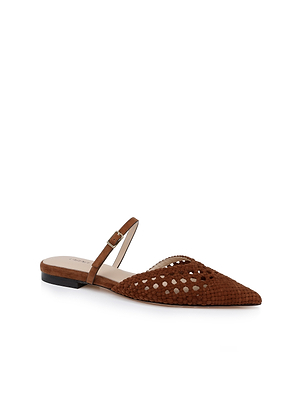 The Jacklyn Suede Flat Mule is a brown woven suede, pointed-toe flat with a low black heel and thin ankle strap with a gold buckle, shown on a white background.