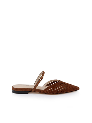 The Jacklyn Suede Flat Mule features a brown woven suede upper, pointed toe, open back, slim adjustable ankle strap, and low black heel, displayed on a white background.