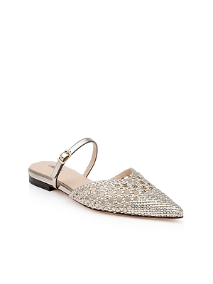 The Jacklyn Leather Flat Mule features a pointed toe, metallic ankle strap, and woven leather upper embellished with silver rhinestones, shown on a white background.