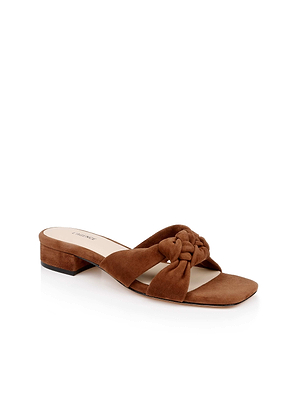 The Lea Suede Knot Sandal is a brown suede slide with a low block heel, two wide straps including one with a stylish knot detail, and features memory foam cushioning for comfort, shown on a white background.