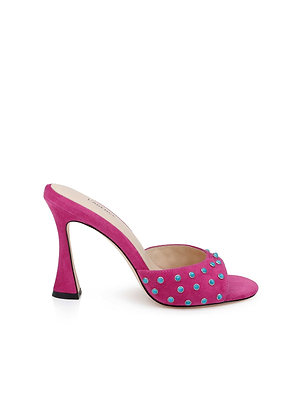 The Lucienne Embellished Suede Mule is a magenta open-toe heel featuring a flared heel and front strap decorated with small turquoise accents.