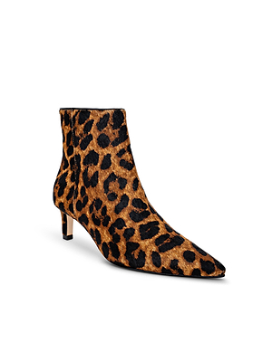 The L'AGENCE Lilly Kitten-Heel Bootie is a women’s city boot with a pointed toe and kitten heel, featuring a bold brown and black leopard-print upper.