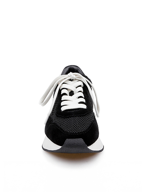 The Deepa Platform Sneaker is shown from the front in black suede with white laces and a white sole against a plain white background. It includes a memory foam insole for all-day comfort and support.