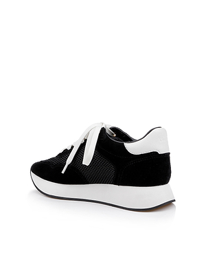 The Deepa Platform Sneaker showcases black suede, white laces, a white heel accent, mesh side texture, and a thick white sole. Its memory foam insole ensures comfort. Shown at an angle.