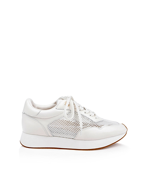 The Deepa Platform Sneaker is a white leather shoe with mesh accents, a chunky white sole, and a brown rubber outsole, shown on a plain white background.