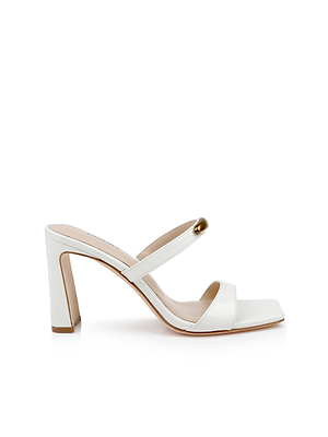 The Catriona Leather Sandal features a white leather design with a square open toe, block heel, two straps at the toe and instep, and a small metallic accent, set against a plain white background.