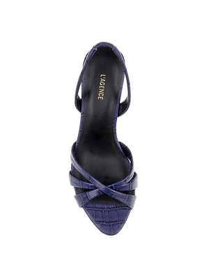 Top view of the Colwill Slingback Sandal in dark blue croc-embossed leather with crisscross straps, a black insole, and mid heel. LAGENCE is printed in gold on the footbed. Displayed on a white background.