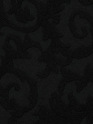 The Lexie Bikini Top features black jacquard terry fabric with a subtle, raised swirling floral pattern, giving it a textured and elegant look. The intricate design blends softly into the background for a refined finish.