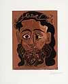 Homme barbu couronné de feuilles de vigne