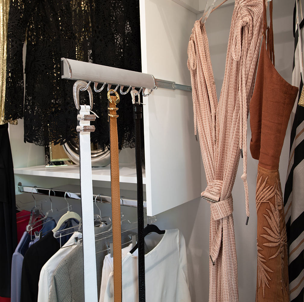 Closet organizer for a toddler with hanging clothes and drawers