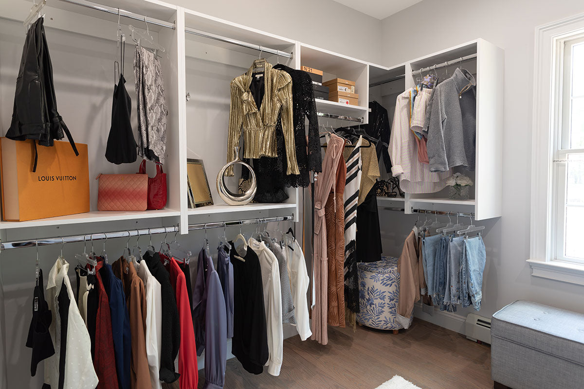 closet with shelving for shoes and clothing