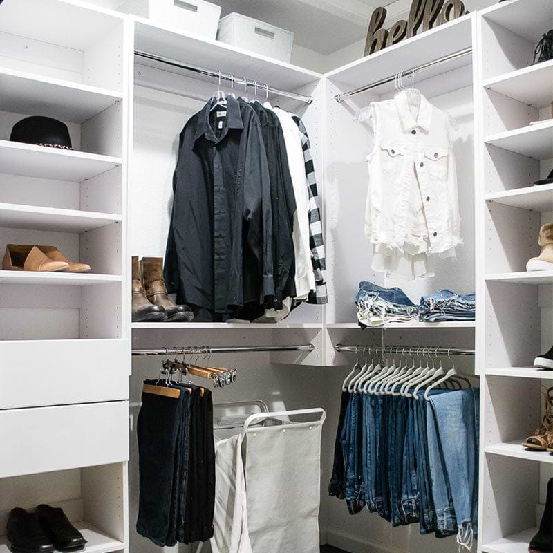 Men's closet system with drawers, shelves, and hanging space 