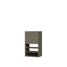 Grey closet drawer tower with slab fronts and shelves for space-saving folded clothing storage.