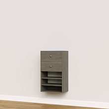 Grey built-in closet drawer cabinet with slab fronts and shelves for custom wardrobe storage.