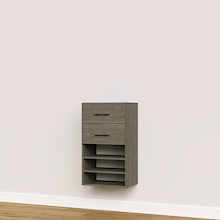 Grey built-in closet drawer cabinet with slab fronts and shelves for custom wardrobe storage.